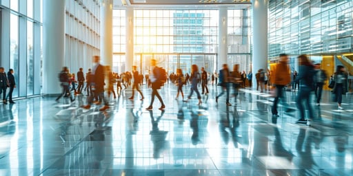 Web_Wide-Office lobby or public space with glass windows and business people. AIG55.
